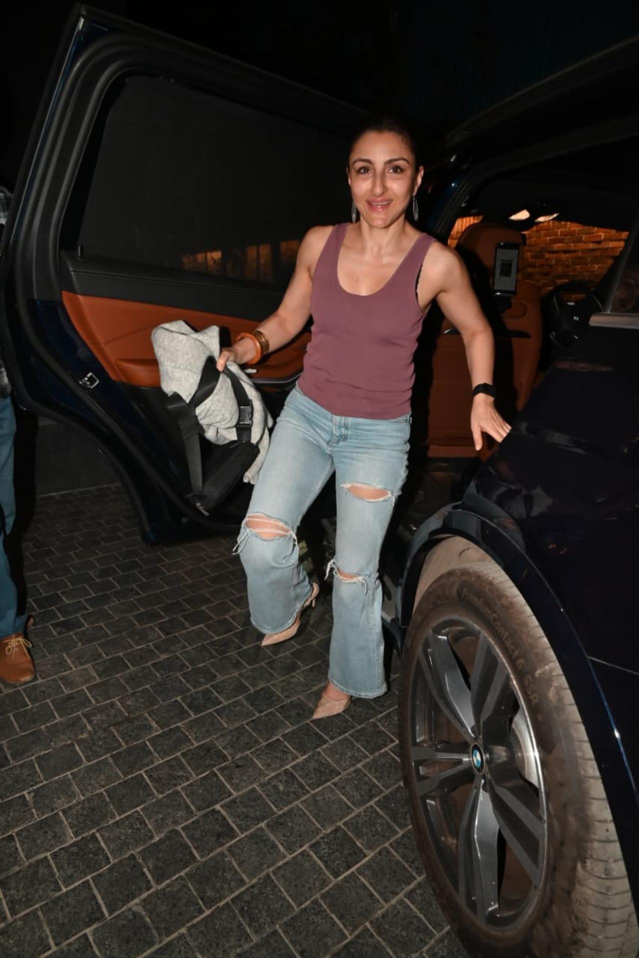 Soha Ali Khan kept it casual yet classy in a tank top and distressed blue jeans, paired with pointed heels.